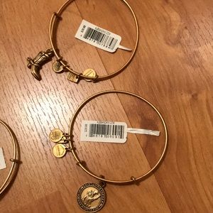 4 Alex and Ani bracelets